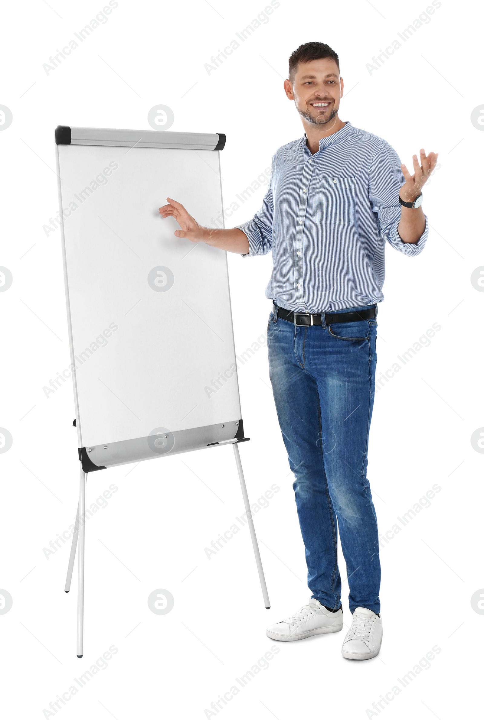 Photo of Professional business trainer near flip chart board on white background. Space for text