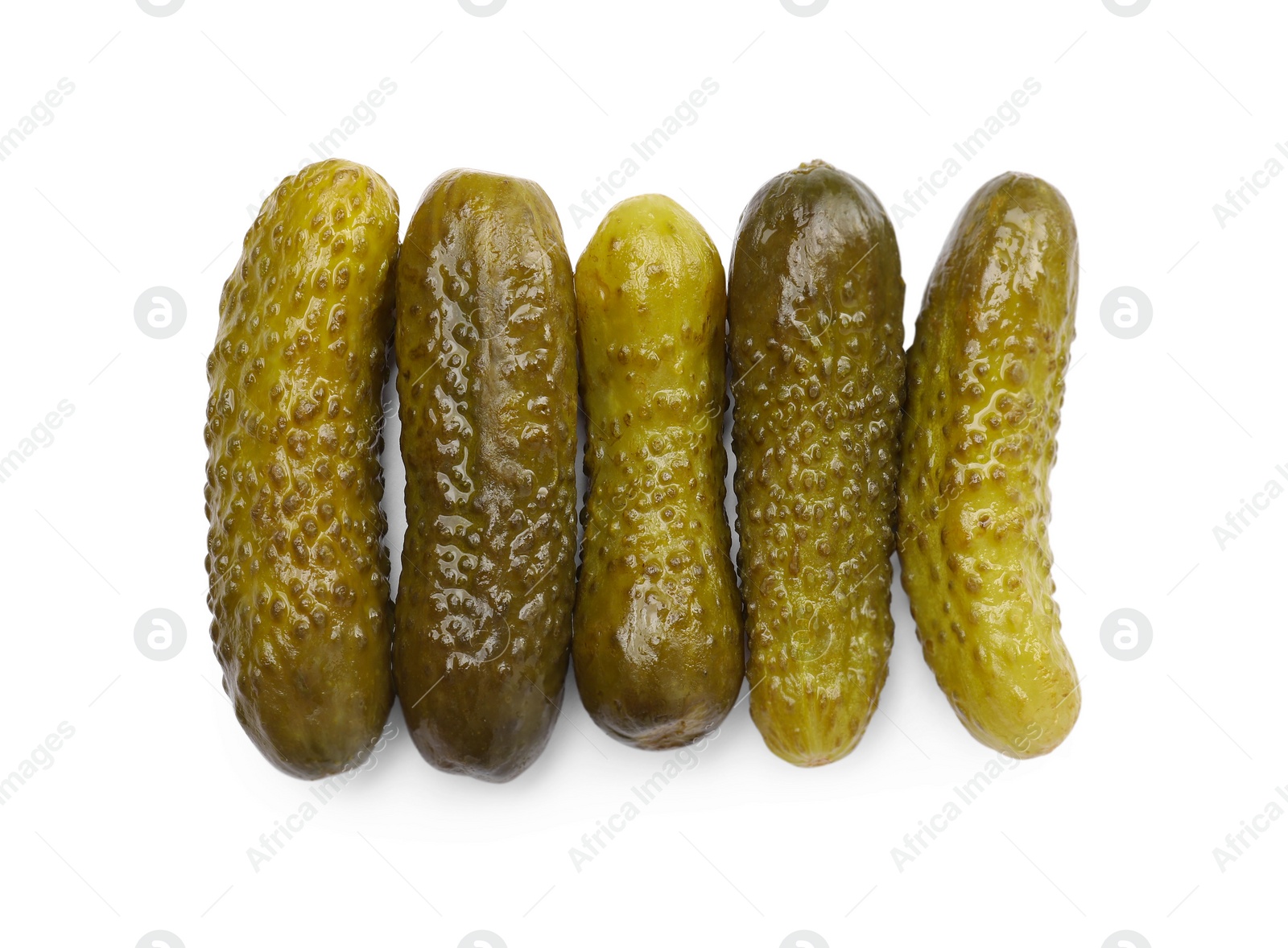 Photo of Tasty pickled cucumbers isolated on white, top view