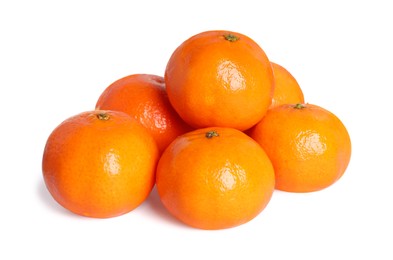 Photo of Many fresh ripe tangerines isolated on white