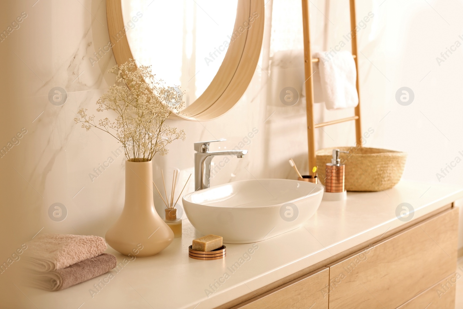 Photo of Modern bathroom interior with stylish mirror and vessel sink