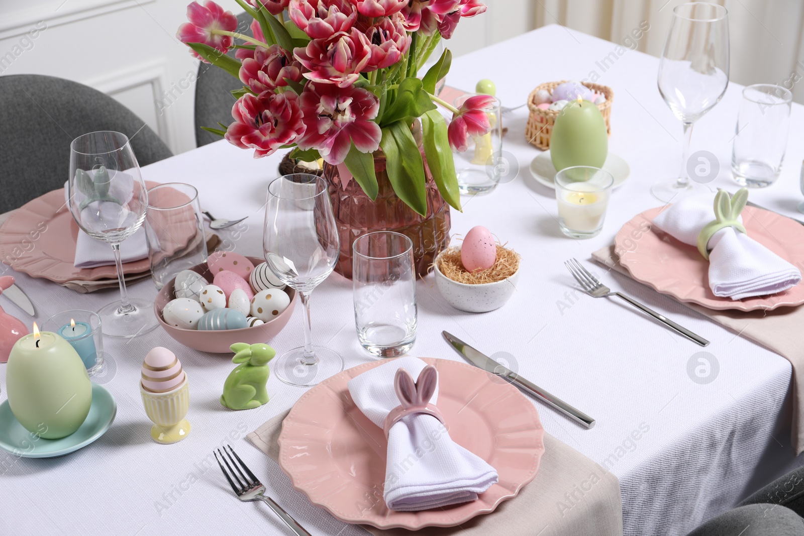 Photo of Festive table setting with beautiful flowers. Easter celebration