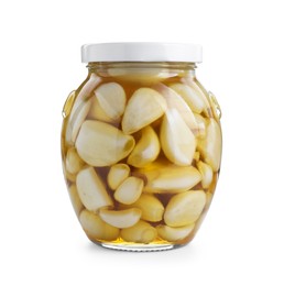 Garlic with honey in glass jar isolated on white