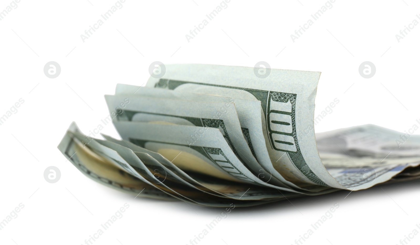 Photo of Dollar banknotes on white background, closeup view