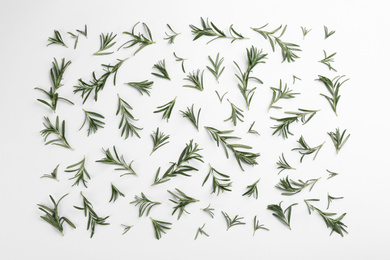 Composition with fresh rosemary on white background, top view