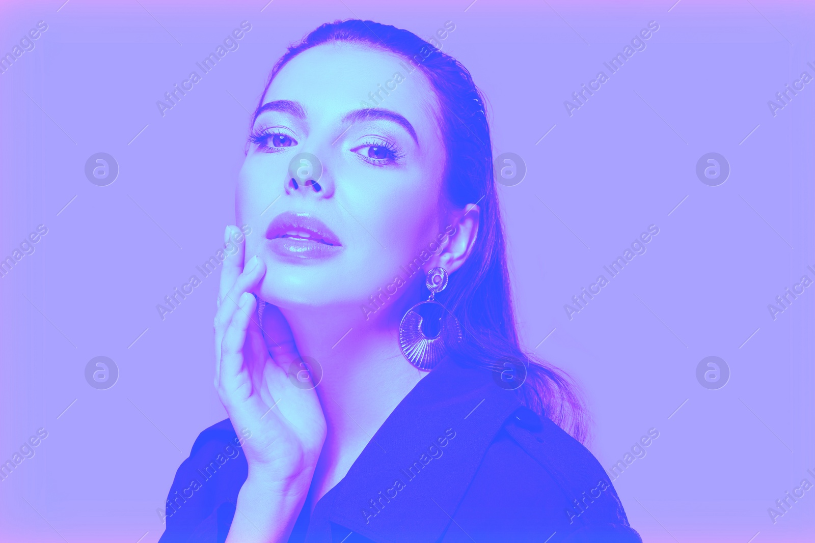 Image of Portrait of beautiful woman in neon lights