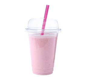 Tasty fresh milk shake in plastic cup on white background