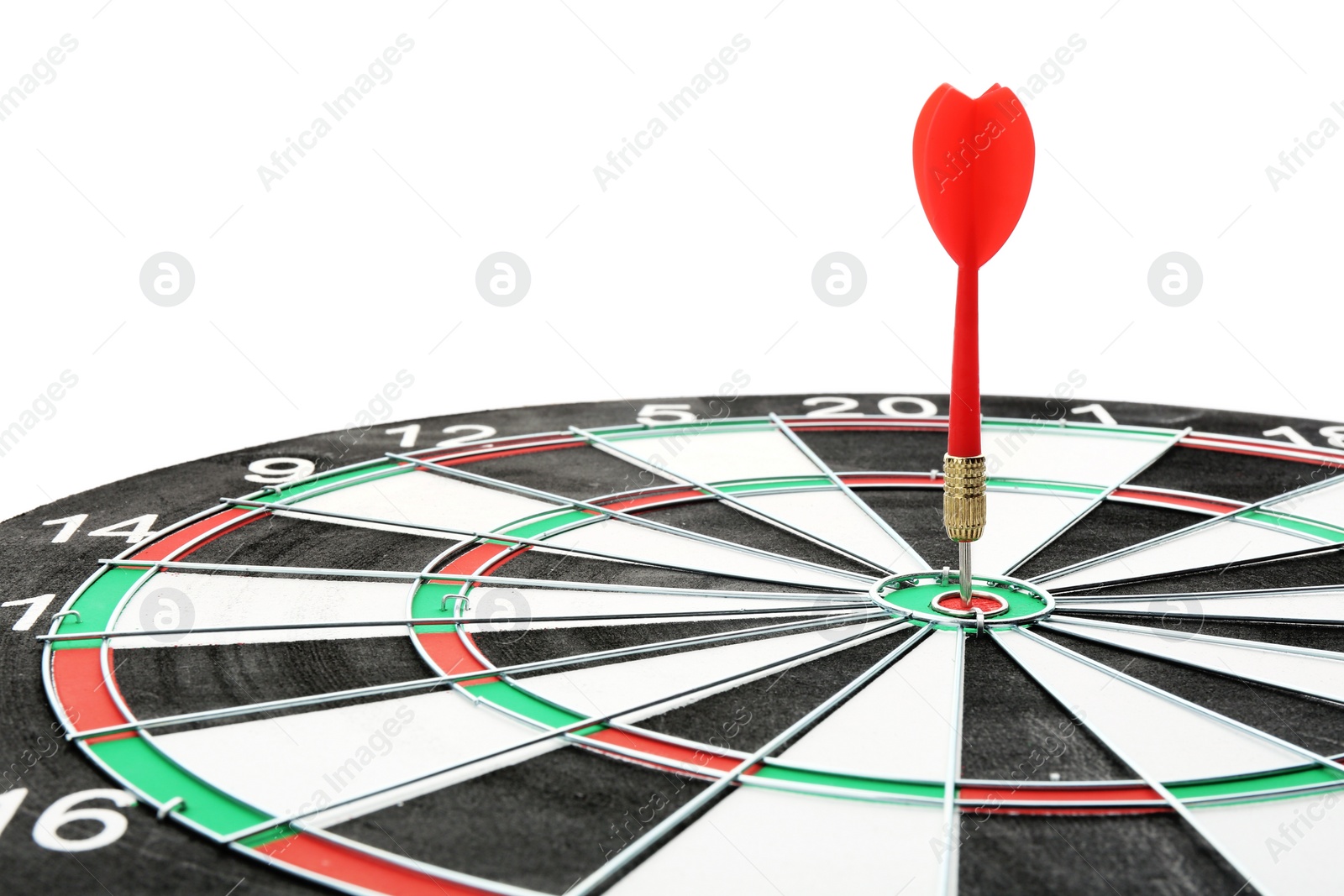 Photo of Dart board with color arrow hitting target, closeup