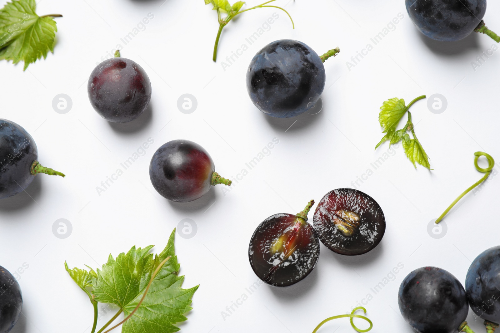 Photo of Fresh ripe juicy grapes on white background, top view