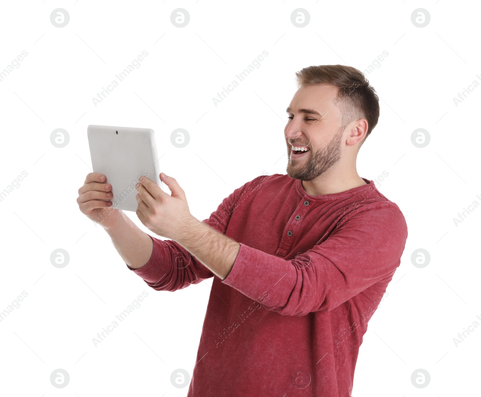 Photo of Young man using video chat on tablet against white background