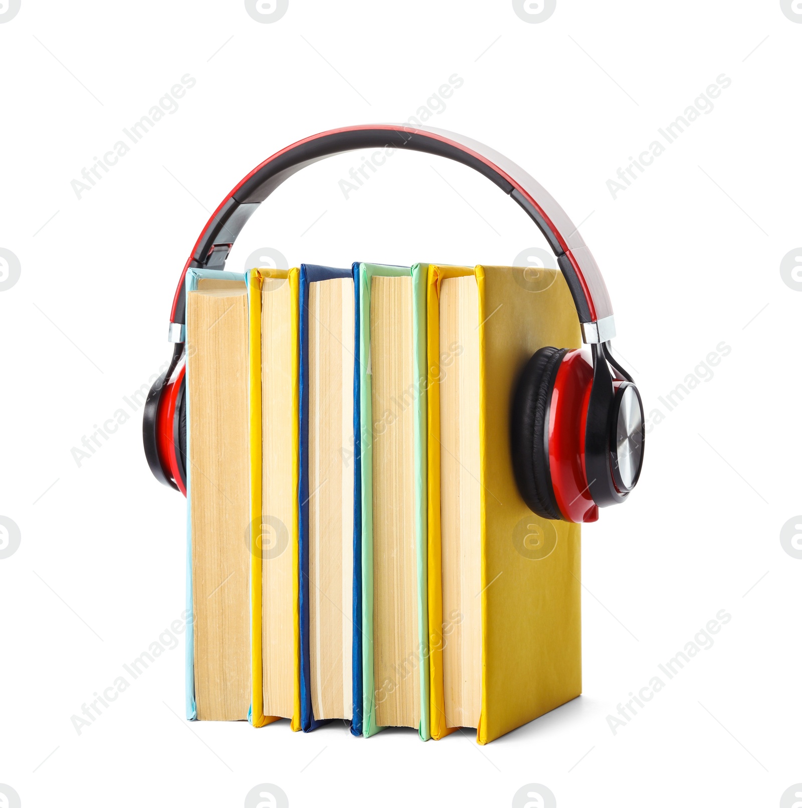 Photo of Books with modern headphones isolated on white