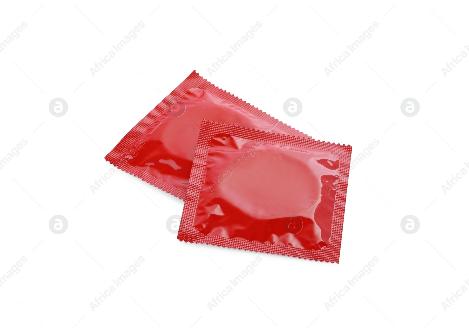 Photo of Condom packages isolated on white. Safe sex