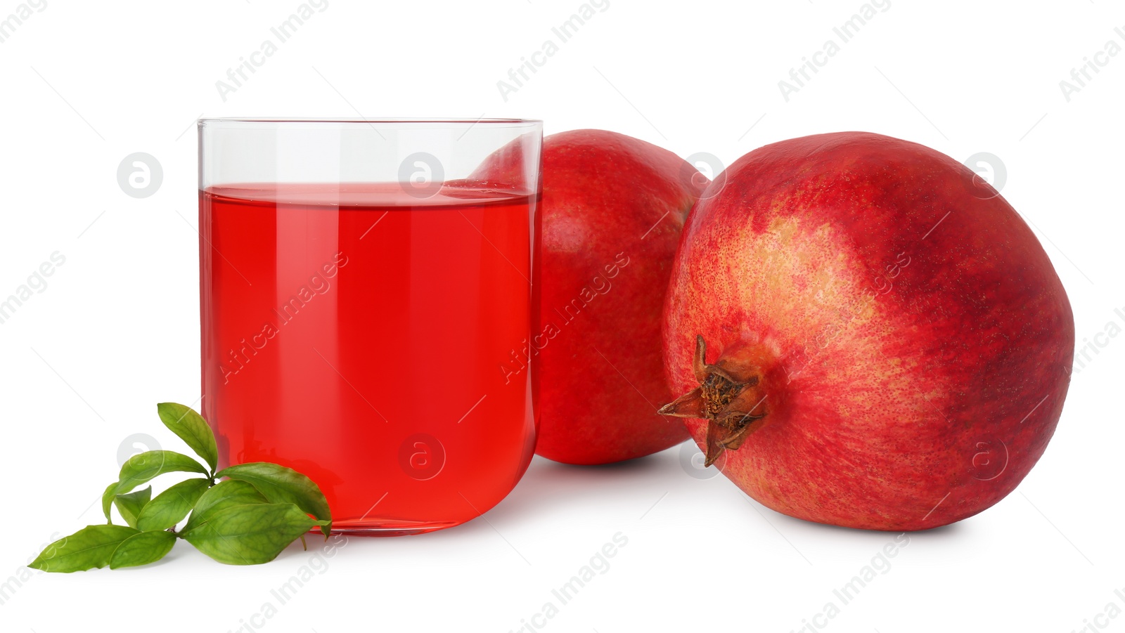 Photo of Refreshing pomegranate juice in glass, leaves and fruits isolated on white