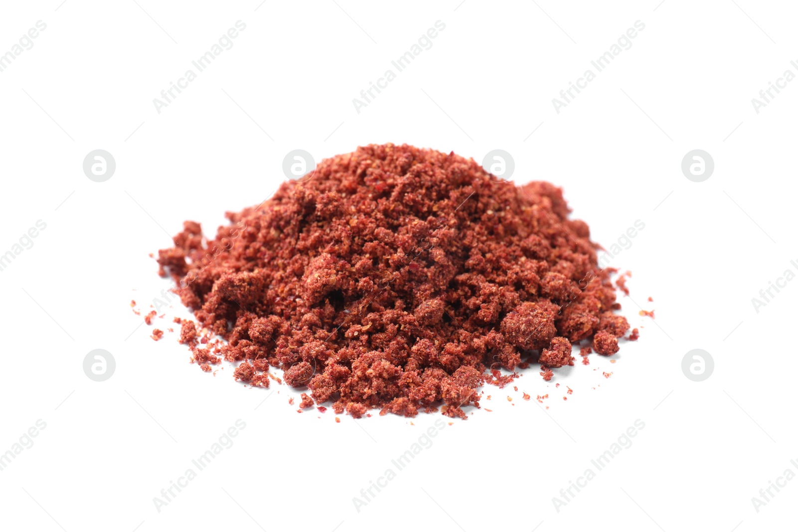 Photo of Heap of dried cranberry powder isolated on white