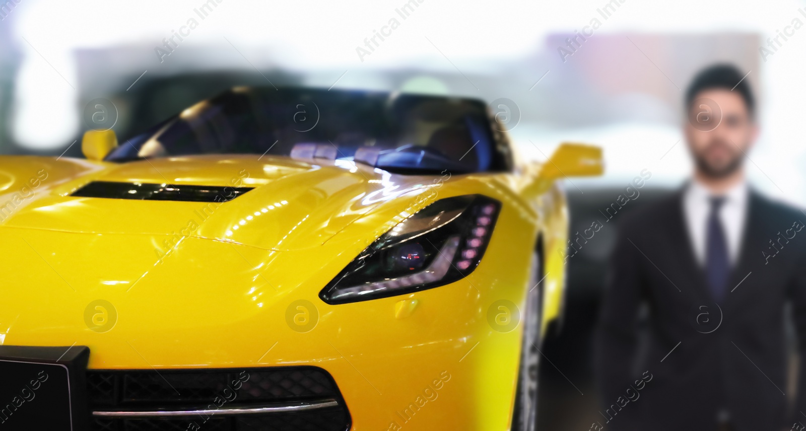 Image of Customer choosing and buying car in dealership, focus on new auto. Banner design