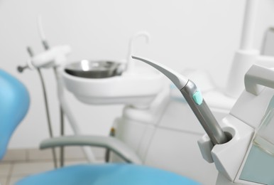 Photo of Professional equipment in dentist's office, space for text