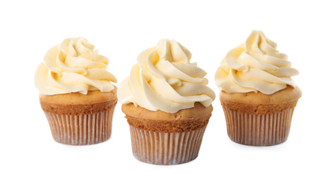 Photo of Delicious birthday cupcakes decorated with cream on white background