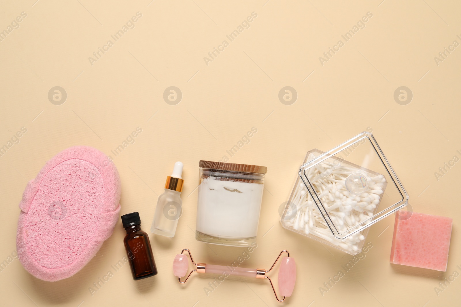 Photo of Bath accessories. Flat lay composition with personal care products on beige background, space for text