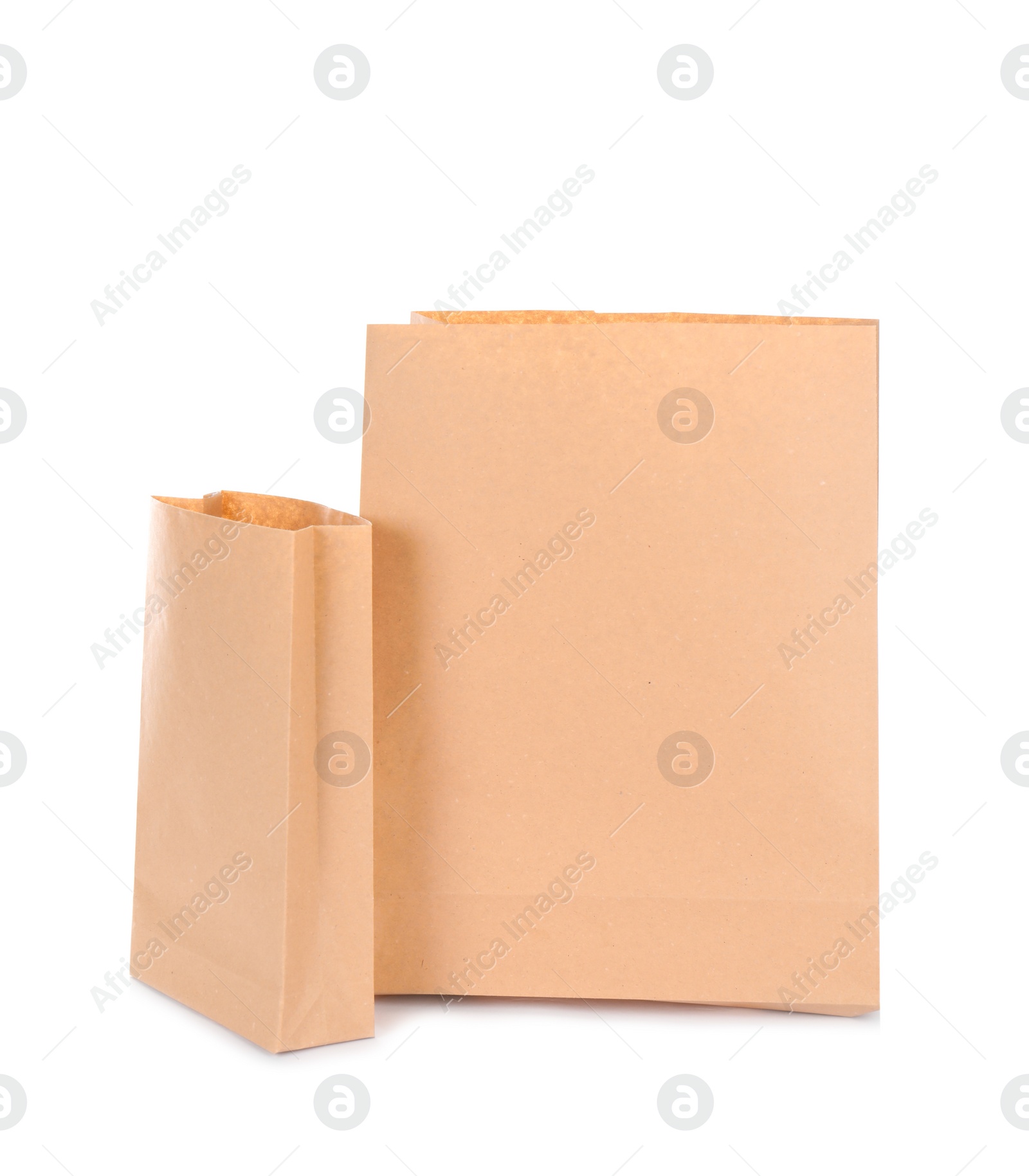 Photo of Paper bags isolated on white. Mockup for design