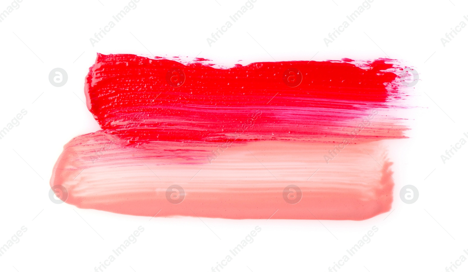 Photo of Strokes of color lip glosses isolated on white, top view