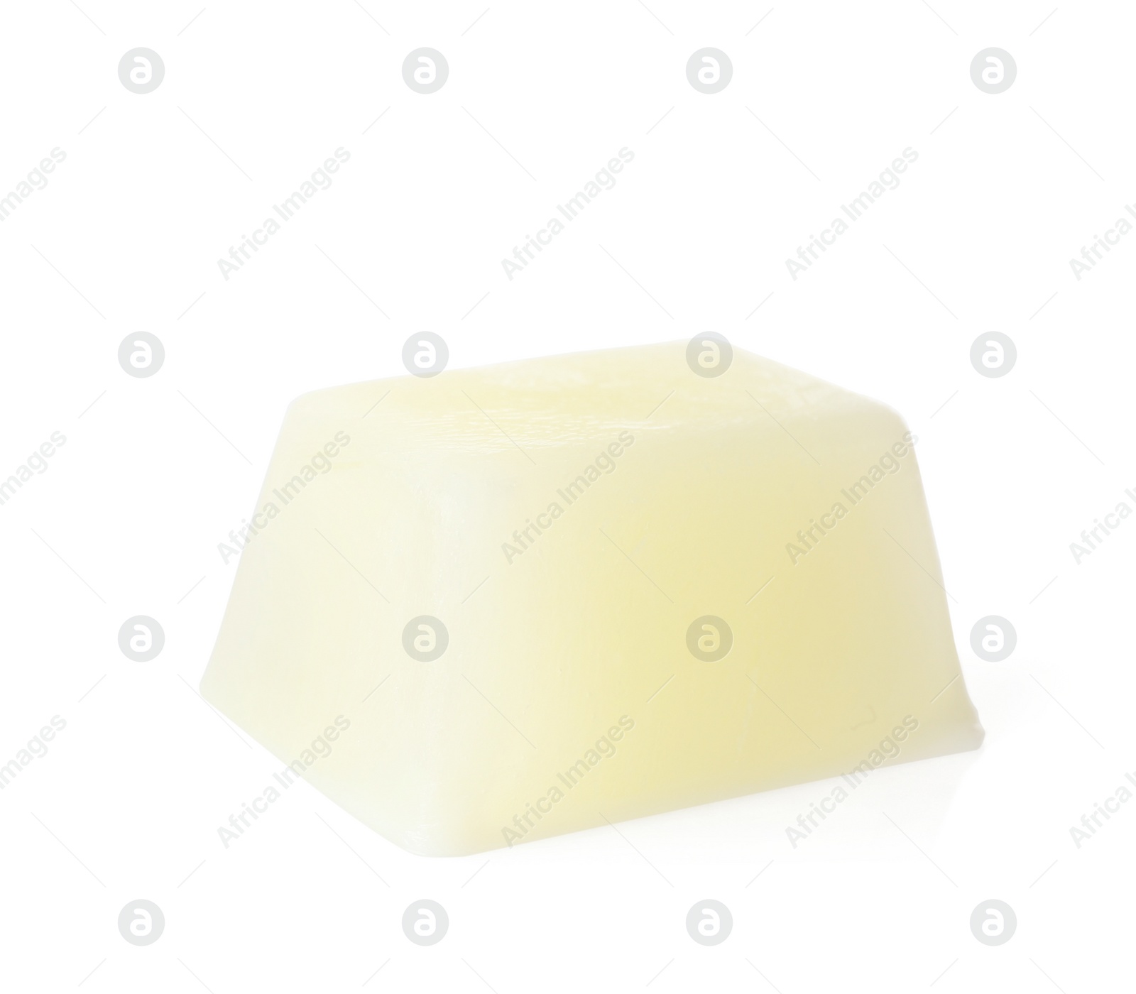 Photo of Tasty milk ice cube on white background