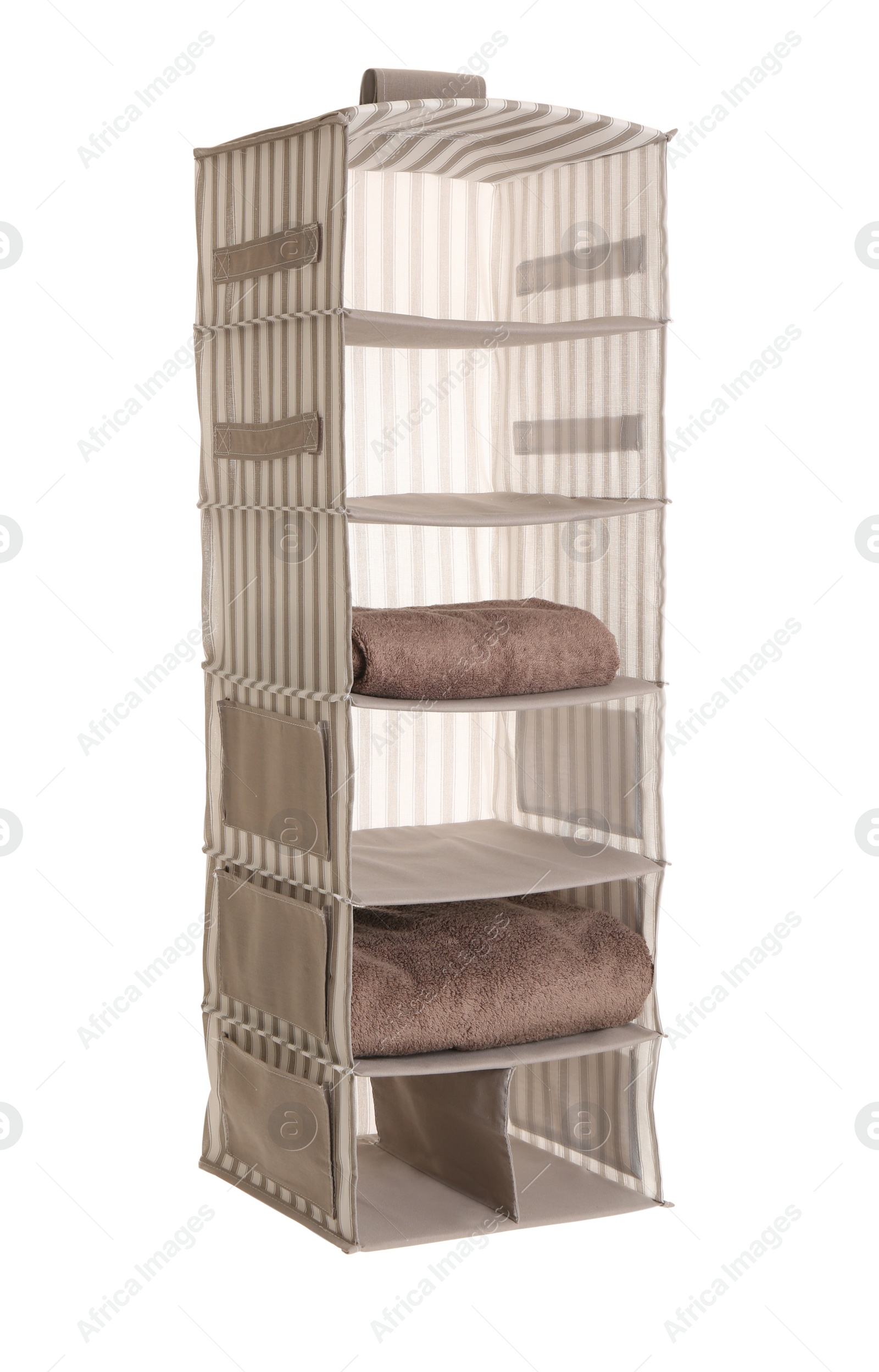 Photo of Foldable organizer with clean towels isolated on white