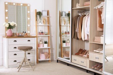 Elegant room with dressing table and wardrobe. Interior design