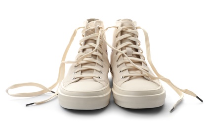 Photo of Stylish sneakers on white background