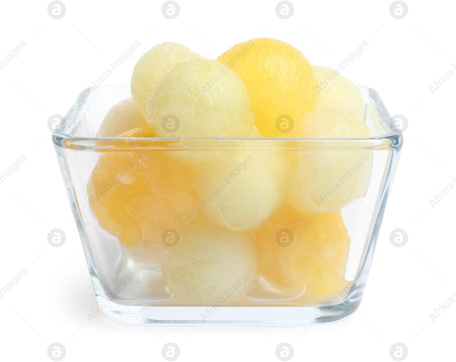 Photo of Glass bowl of melon balls on white background