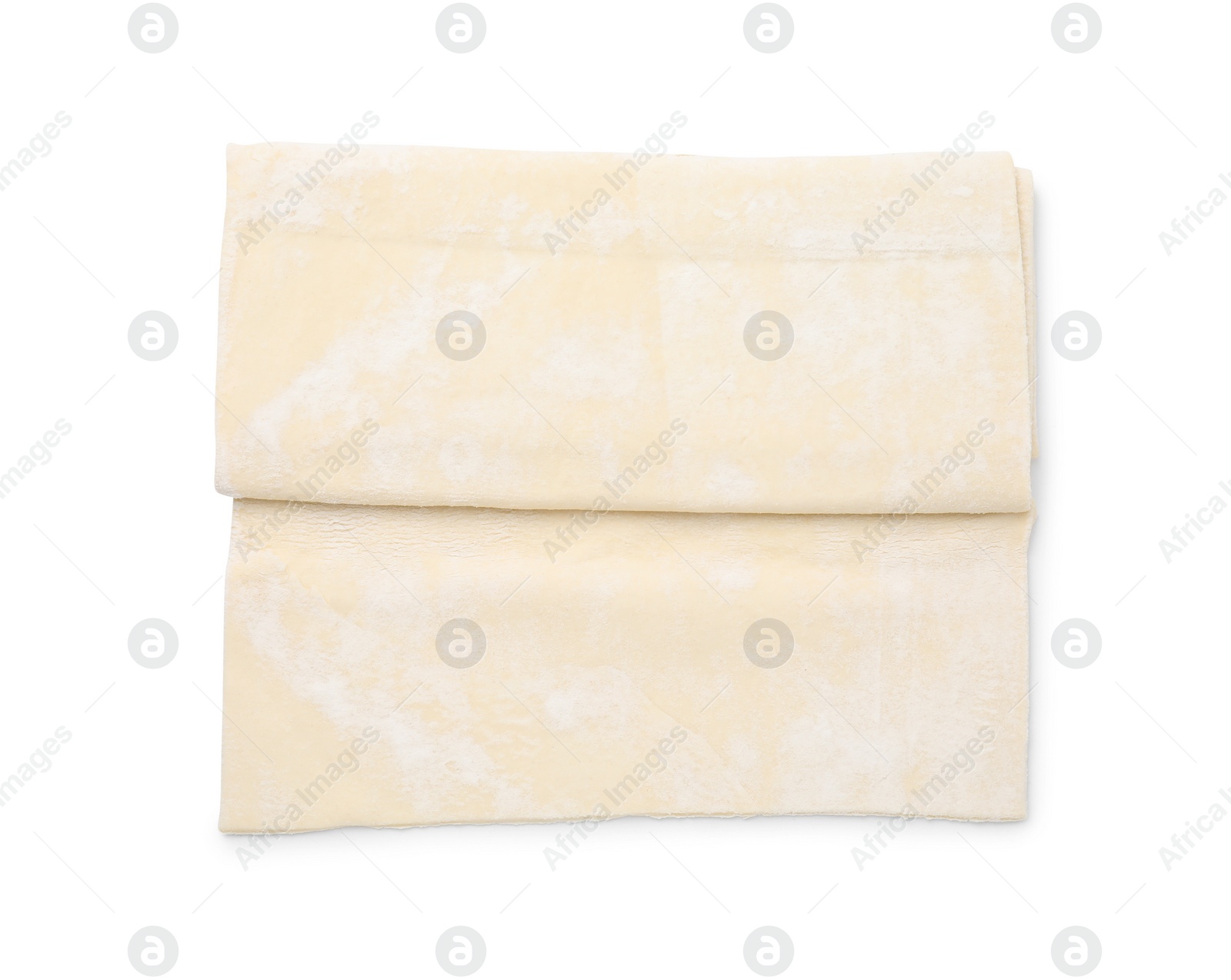 Photo of Raw puff pastry dough isolated on white, top view