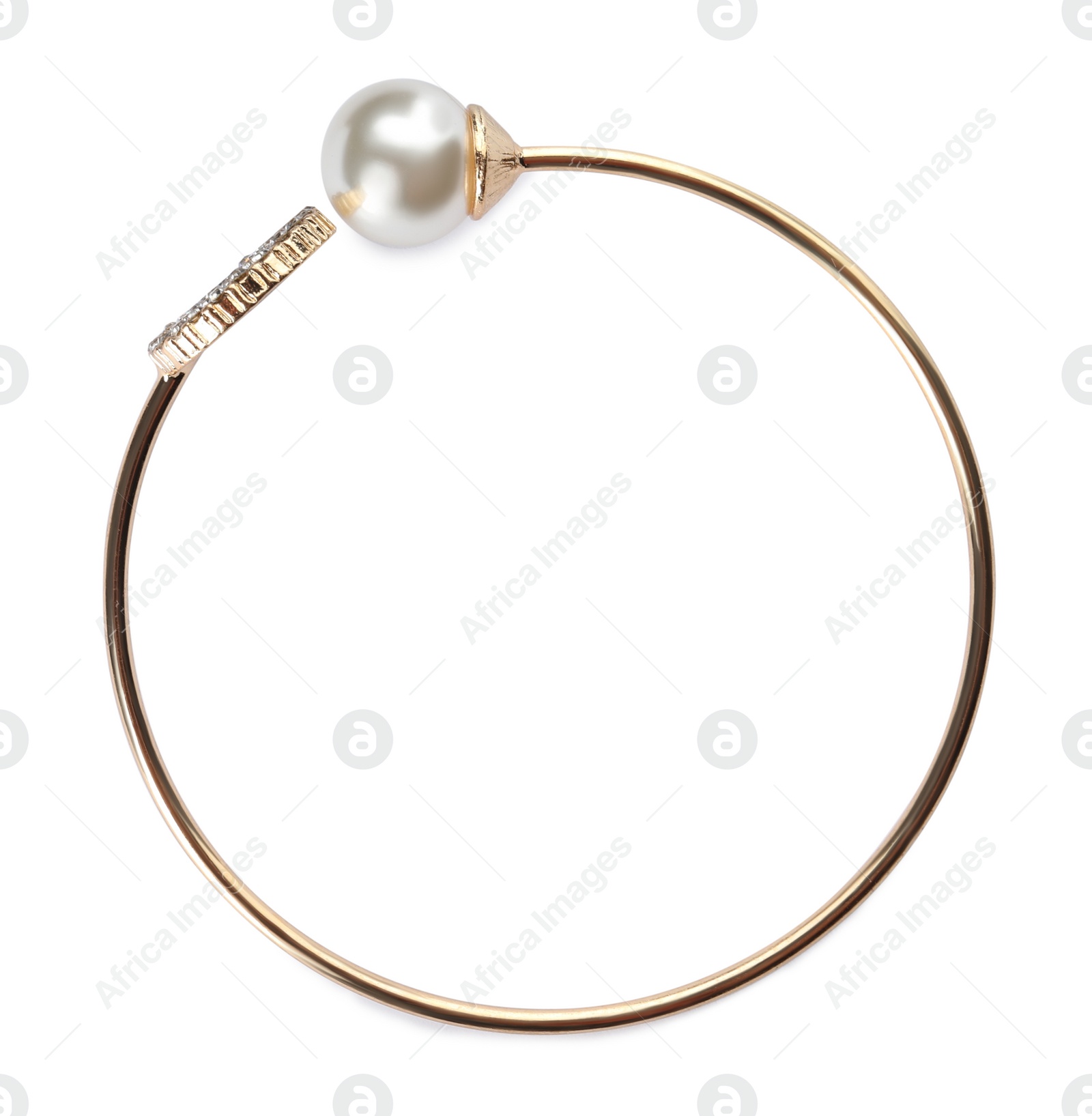 Photo of Elegant golden bracelet with pearl isolated on white, top view