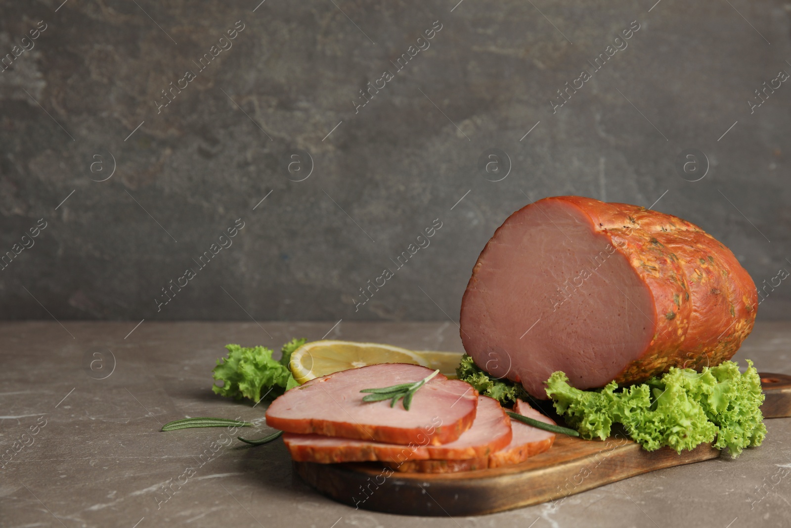 Photo of Delicious homemade ham served on marble table