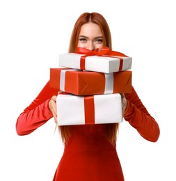 Young woman in red dress with Christmas gifts on white background