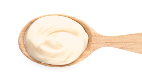 Photo of Wooden spoon with tasty mayonnaise isolated on white, top view