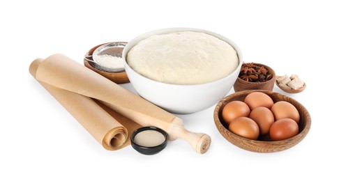Photo of Composition with fresh yeast dough, parchment paper and ingredients on white background. Making cake