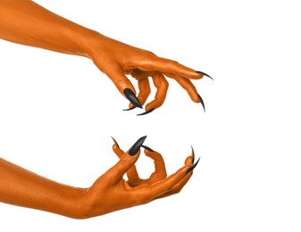 Creepy monster. Orange hands with claws isolated on white