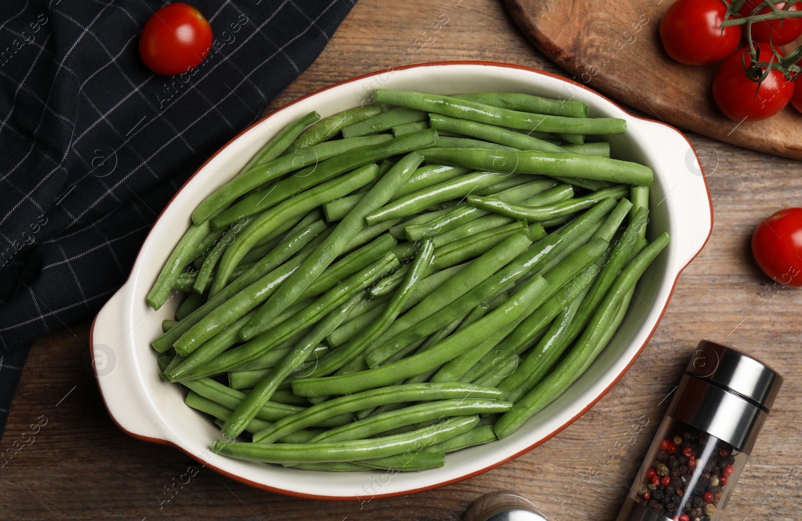 Photo of Flat lay composition with raw green beans on wooden table