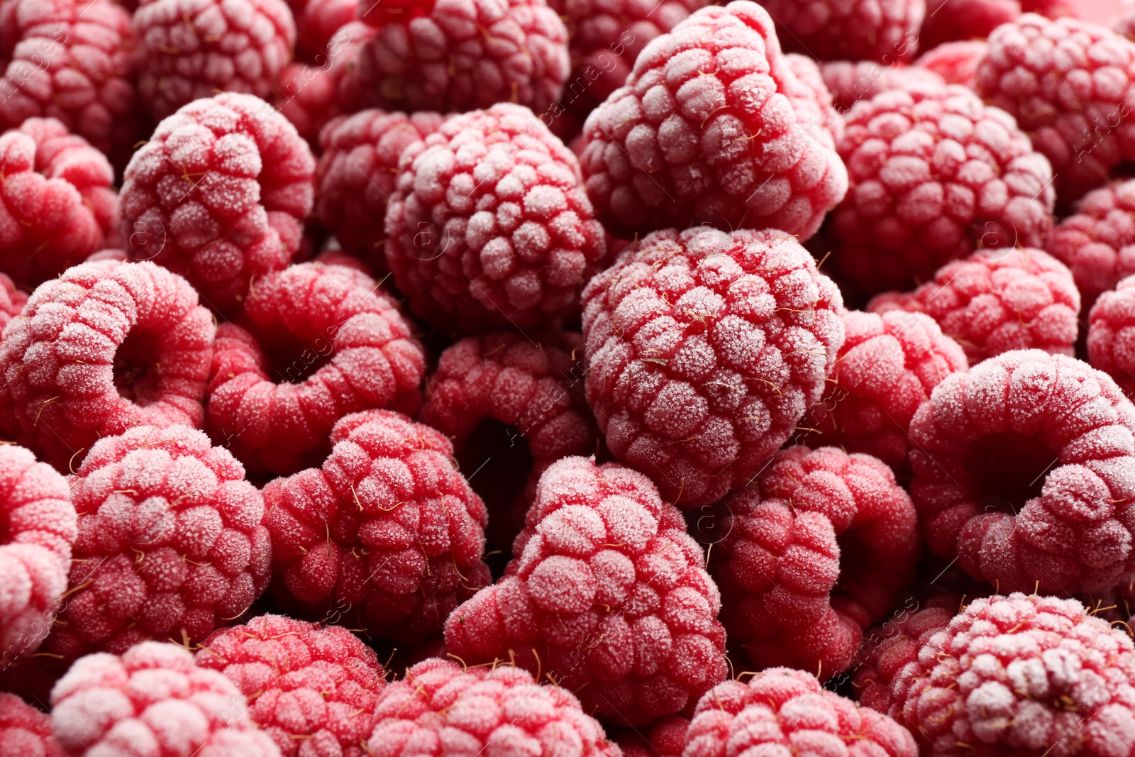 Photo of Tasty frozen raspberries as background, closeup view