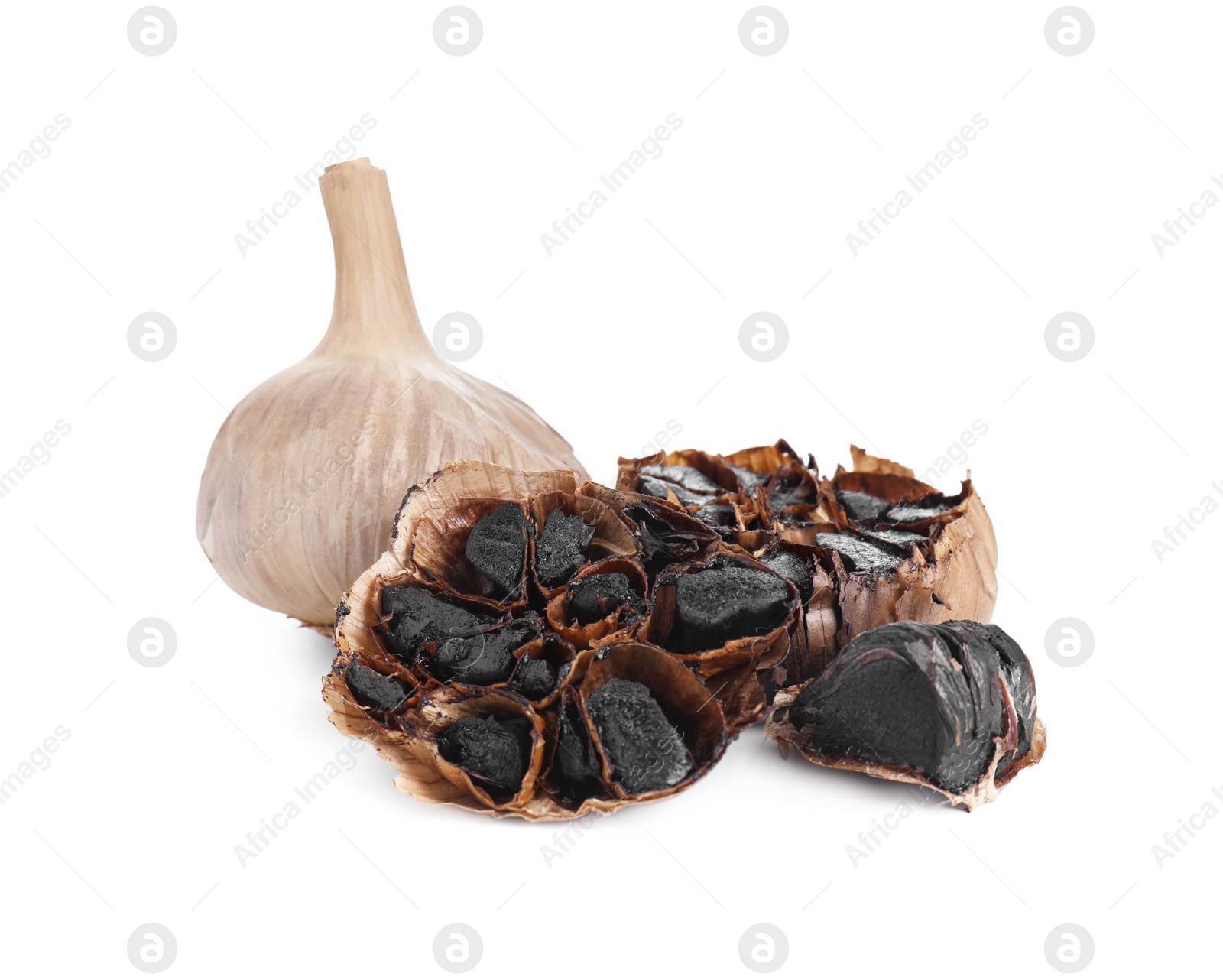 Photo of Organic fermented black garlic isolated on white