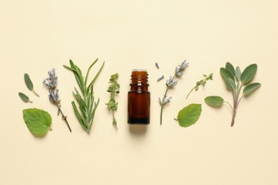 Photo of Bottle of essential oil and different herbs on beige background, flat lay