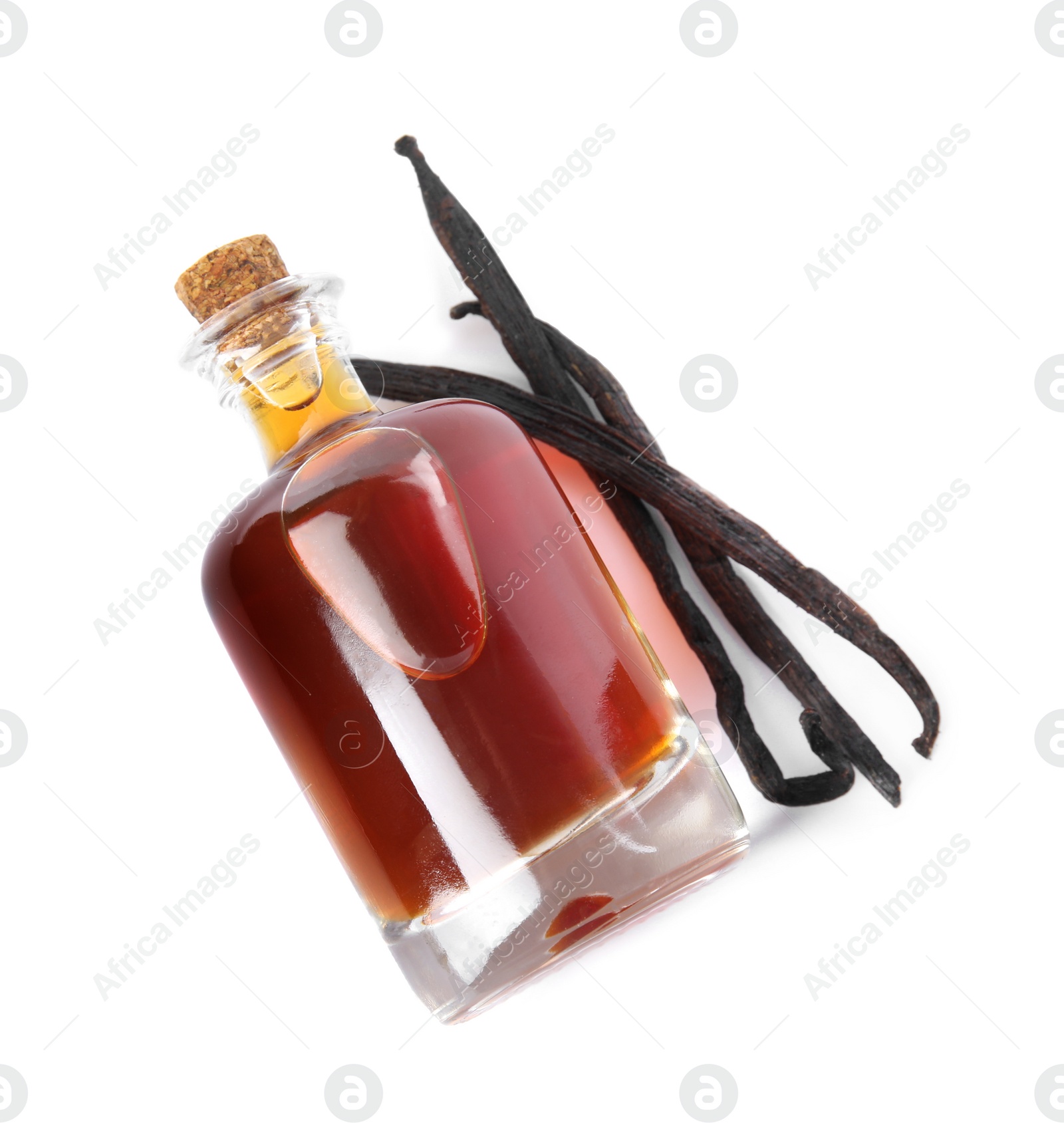 Photo of Vanilla extract and dry pods isolated on white, top view