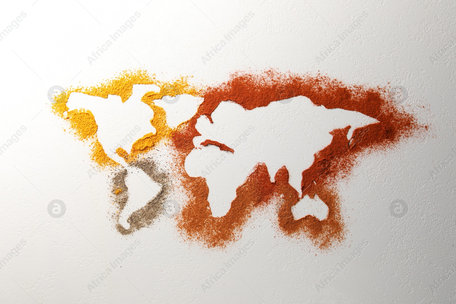 Photo of World map of different spices on white textured table, flat lay