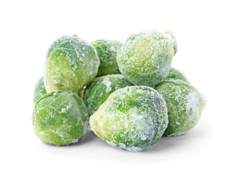 Photo of Frozen brussel sprouts on white background. Vegetable preservation