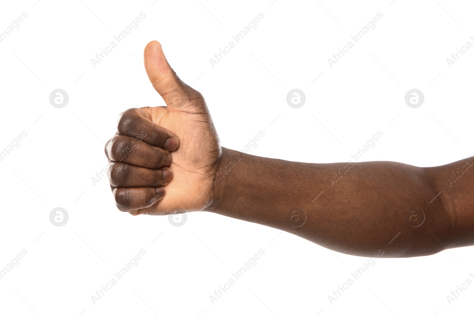 Photo of African-American man showing thumb up gesture on white background, closeup