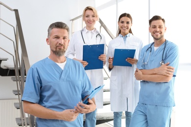 Photo of Doctors and medical assistants in clinic. Health care service