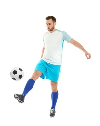 Young man playing football on white background