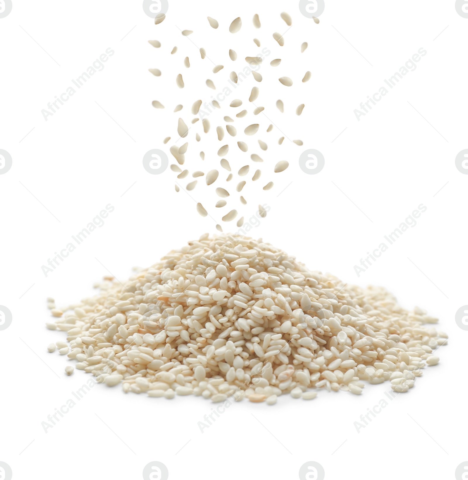 Image of Sesame seeds falling into pile on white background 