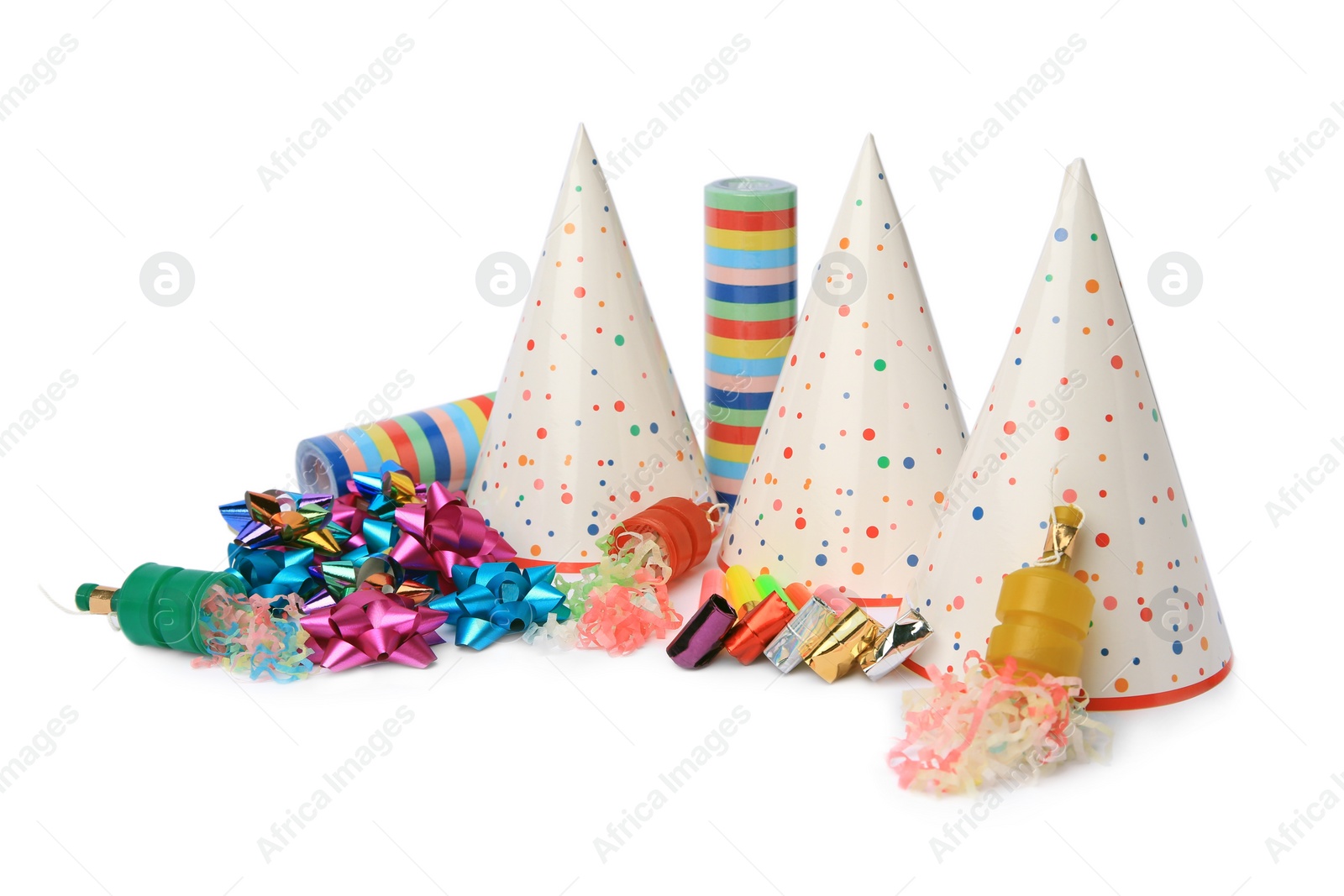 Photo of Party crackers and different festive items on white background