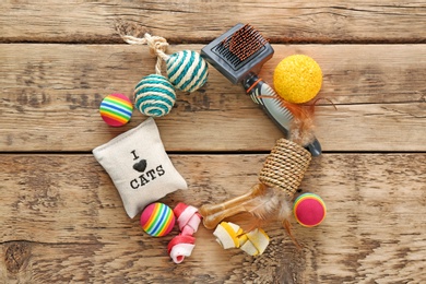 Photo of Cat's accessories on wooden background