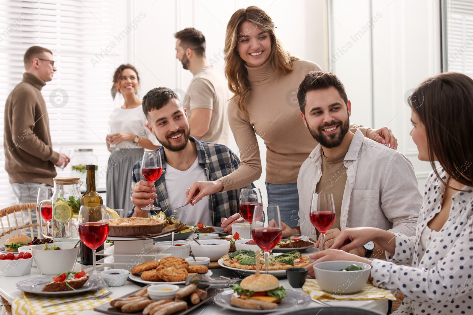 Photo of Group of people having brunch together indoors