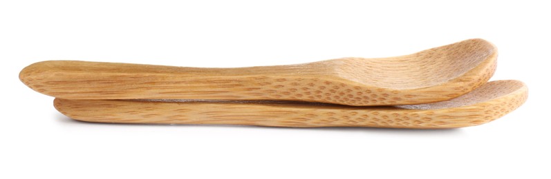 Two new wooden spoons on white background